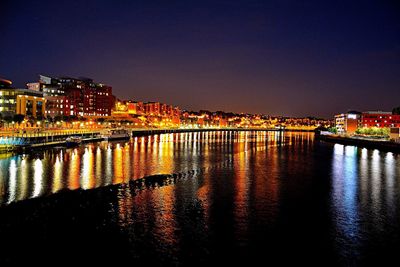 Illuminated cityscape at night