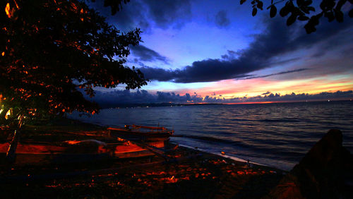 Scenic view of sea at sunset