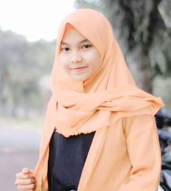 Portrait of a smiling young woman