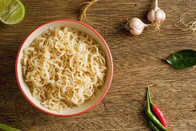 High angle view of rice in bowl on table