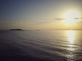 Scenic view of sea at sunset