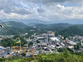 High angle view of buildings in city against sky