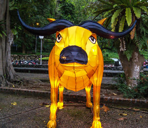 Close-up of yellow animal representation