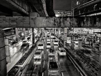 High angle view of bridge amidst buildings in city