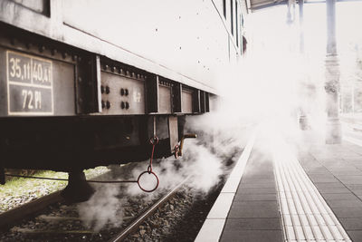 Train at railroad station in city