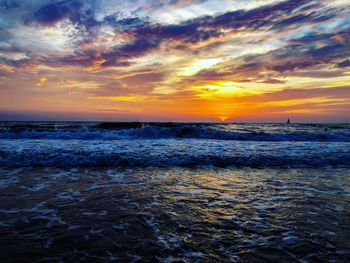 Scenic view of sea against sky during sunset