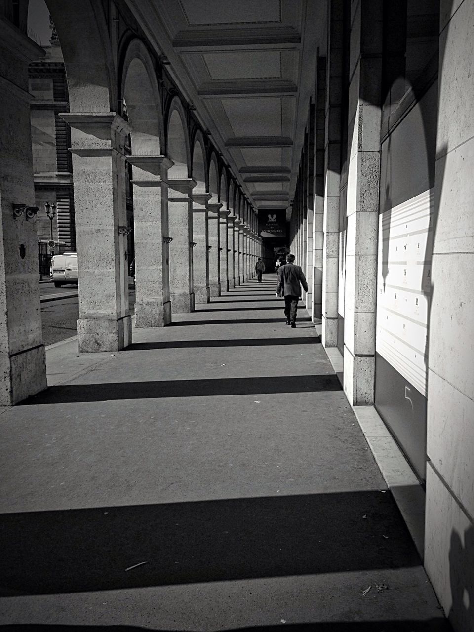 the way forward, architecture, built structure, indoors, diminishing perspective, walking, corridor, men, vanishing point, transportation, full length, building, incidental people, architectural column, building exterior, walkway, rear view, lifestyles