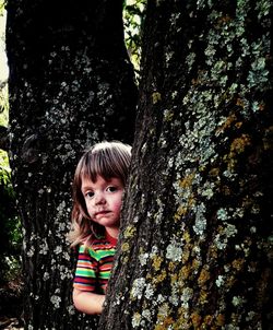 Portrait of girl in tree