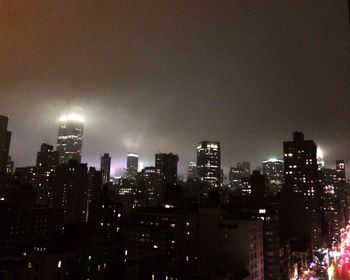 Illuminated cityscape at night