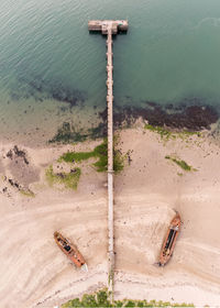 High angle view of rusty metal on beach