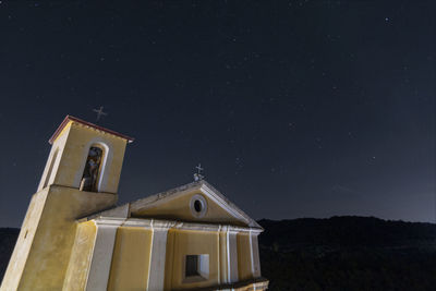 Low angle view of building against sky at night