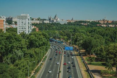 High angle view of vehicles on road in city