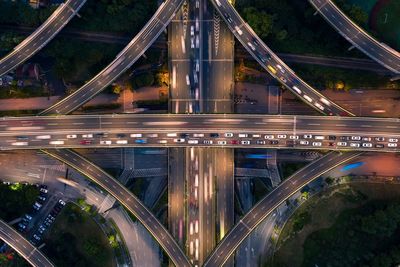 High angle view of light trails on road in city