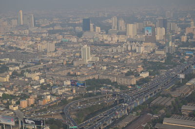 High angle view of street amidst buildings in city