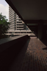 Modern building in city against sky