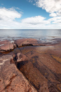 Scenic view of beach against sky