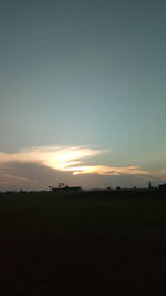 Scenic view of silhouette landscape against sky during sunset