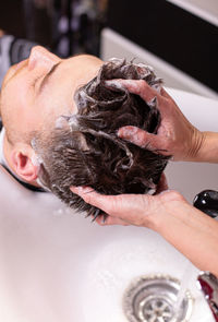 Close-up of man with hand