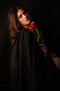 Portrait of woman with bouquet