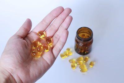 Close-up of hand holding cup