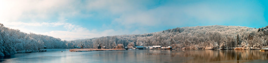 Winter panorama with windmills on a foggy winter day, sibiu, romania