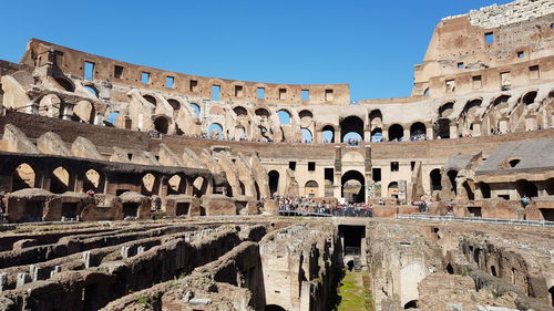 Exterior of historic building against sky in city colosseum 