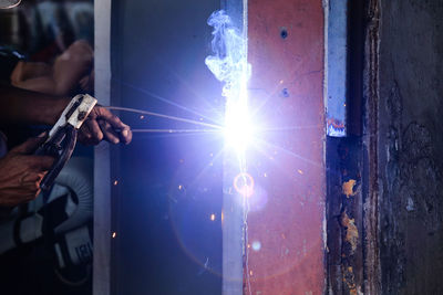 Man working on metal structure