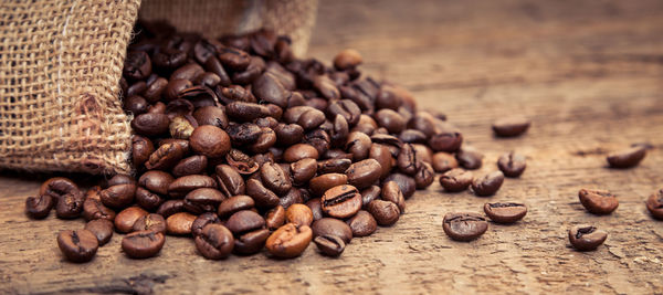 Directly above shot of roasted coffee beans on table