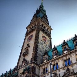 Low angle view of church against blue sky