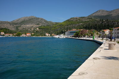 Scenic view of sea against blue sky