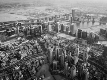 High angle view of river amidst buildings in city