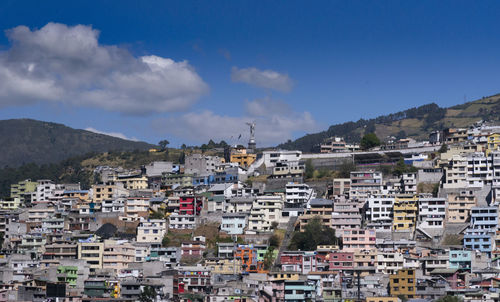 Buildings in city against sky