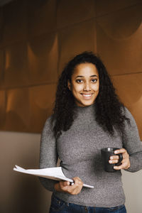 Smiling woman looking at camera