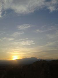 Scenic view of silhouette landscape against sky during sunset