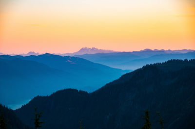 Scenic view of mountains against sky during sunset