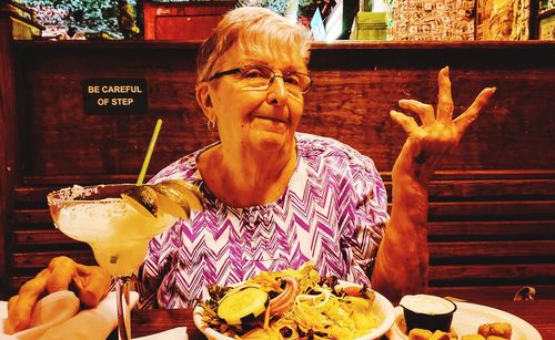 Portrait of woman holding ice cream