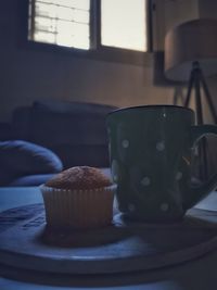 Close-up of coffee cup on table