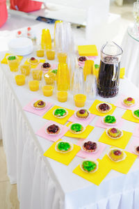 High angle view of multi colored glass on table