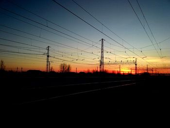 Electricity pylon at sunset