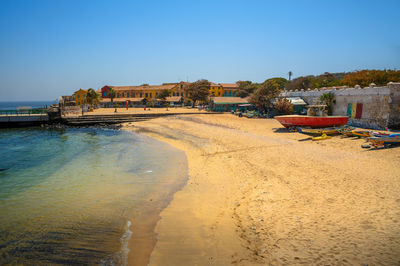 Scenic view of sea against clear blue sky