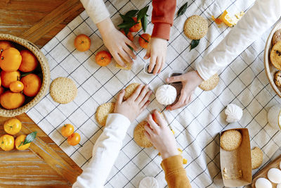 High angle view of people on table