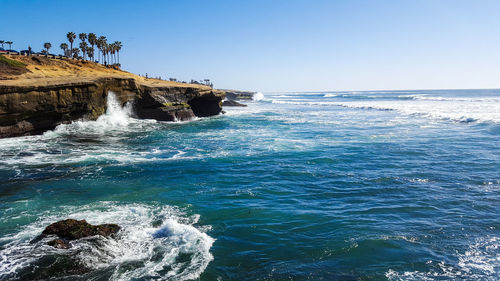 Scenic view of sea against clear sky