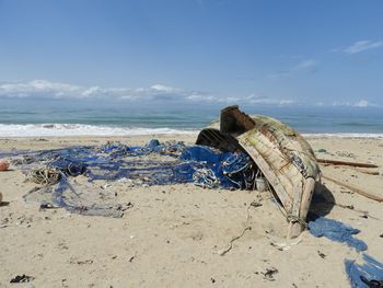 Fishing boat at beach with fishingnet in ghana ada foah west africa