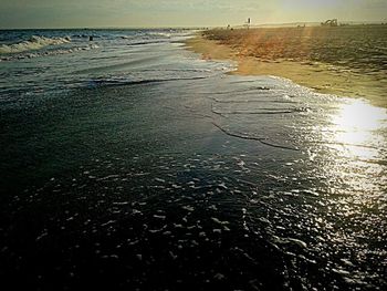 Scenic view of sea at sunset