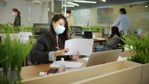 Businesswoman sitting at office