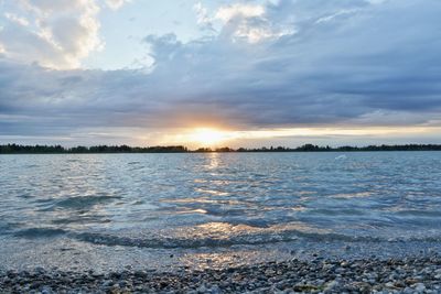 Scenic view of sea against sky during sunset