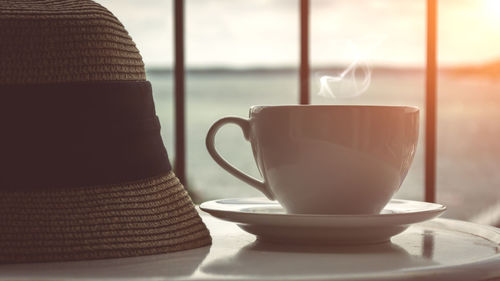 Close-up of coffee cup on table