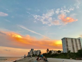 Panoramic view of buildings against sky during sunset