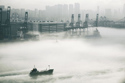 View of hong kong harbor during foggy weather