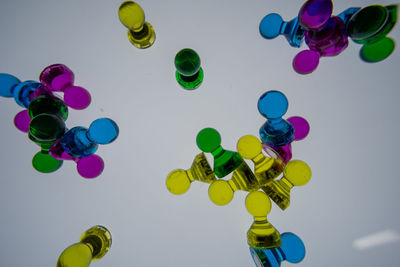 High angle view of multi colored balloons on table